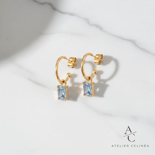 Blue Zircon Earrings - Flat lay marmer